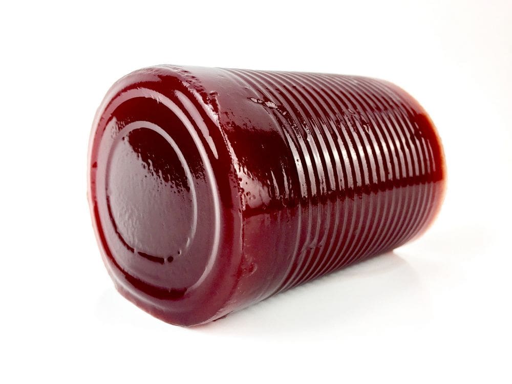 The contents of a cranberry sauce can that people think is upside down.