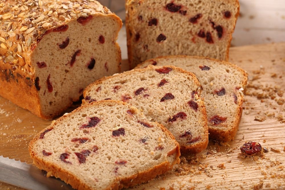 Recipe for some delicious bread that has sprinkles of cranberries baked inside.