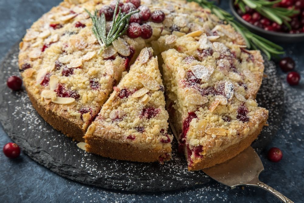 A Xmas cake made for the holiday season with red, fresh cranberries