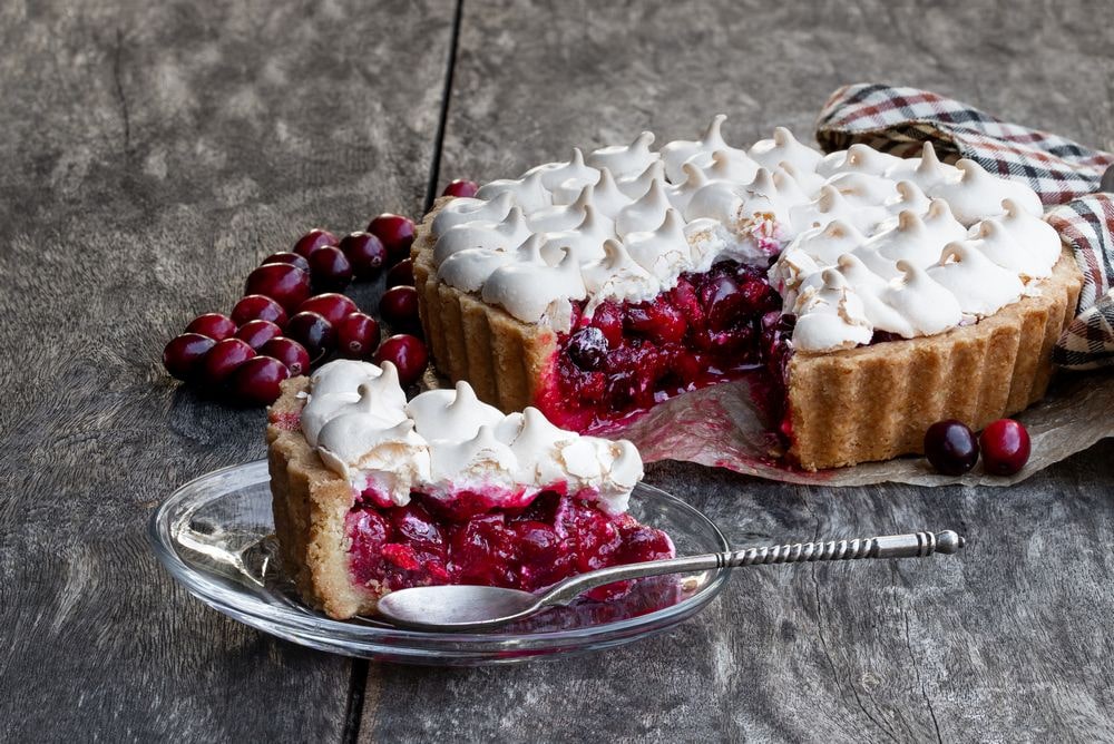 A freshly baked pie recipe with meringue and cranberries