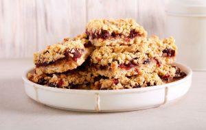 Recipe for a delicious dessert featuring a crumble like topping with cranberry center filling.