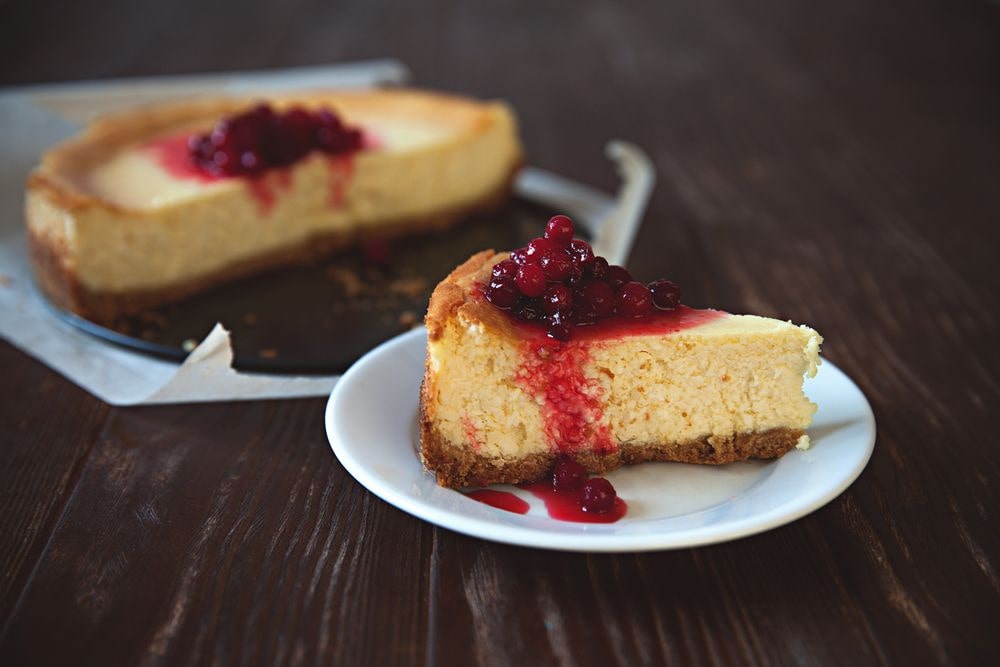 Cheesecake with Graham Cracker crumbs and cranberry topping 