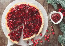 A nice, succulent cheesecake topped with juicy cranberry coulis.