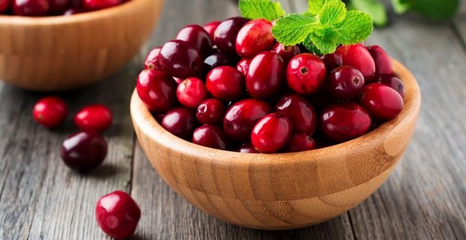 A bowl of hard red cranberries that are wrong.
