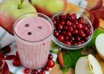 A smoothie with protein powder, cranberries and coconut milk.