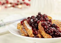 Home made recipe for French Toast topped with fresh cranberry topping