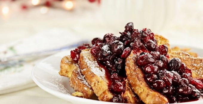Home made recipe for French Toast topped with fresh cranberry topping