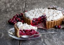 A freshly baked pie recipe with meringue and cranberries