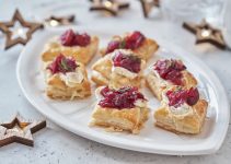 Recipe for a baked dish of dough with cranberry sauce and brie cheese.