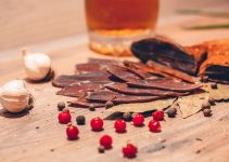 Dried meat and cranberries are ingredients found in Pemmican.